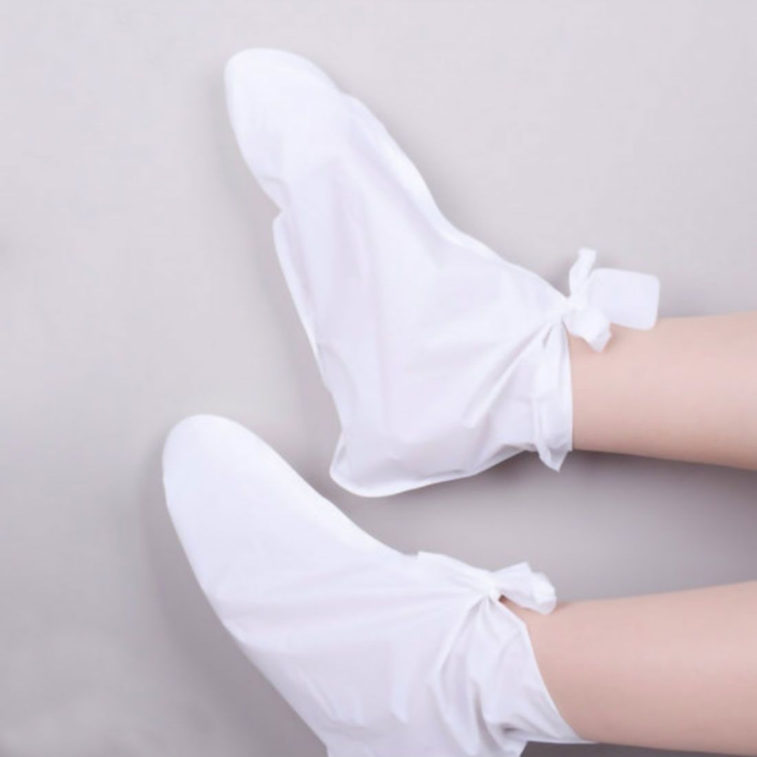 Jigott Отшелушивающие пилинг-носочки  Clean & Moisturizing Foot Pack